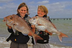 Charlie Poulter and Sebastian Hill with a sample of their snapper catch off Point Wilson on Sunday.