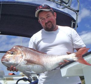 Tim Carroll with the 6.5 kg snapper he caught off Curlewis (Picture: Mike Windsor).