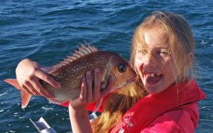 Eleven year old Renae Batten with the snapper she caught off Clifton Springs while fishing with he father Rod (Picture: Rod Batten).