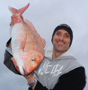 Bill Athanasselis with his snapper from Black Rock on Sunday morning.