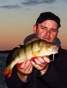 Michael Evans with his 42 cm redfin from Wurdiboluc Reservoir (Picture: Michael Evans).   