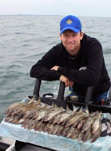 Australian cricketer Cameron White with his and Aaron Hapgood’s whiting catch off Queenscliff last week.