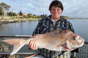 Bailey Vermolen with the 7.8 kg snapper he caught from the Lee Breakwater at Portland (Picture: Bob McPherson).