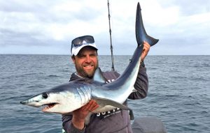 Mini mako: Sean Mayall with the mako shark he caught offshore from Port Phillip Heads (Photo Brad Andrews).