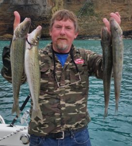 Lockie Wombell with four nice whiting taken close in to Cape Sir William Grant (Picture: Bob McPherson).