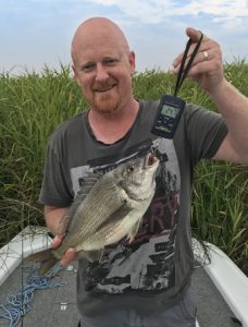 David Lees with the bream he caught from the Barwon estuary upstream from Lake Connewarre (Picture Sean Dennis).