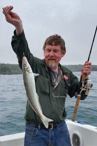 Lockie Wombell with yet another good size whiting off Blacknose Point at Portland (Picture: Bob McPherson).