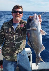 Lockie Wombell with a good size blue eye trevalla taken offshore from Portland (Picture: Bob McPherson).