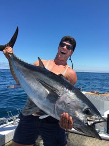 Jake Donaldson with one of the tuna that he and his brother Sam caught off Portland last week (Picture: Sam Donaldson).   