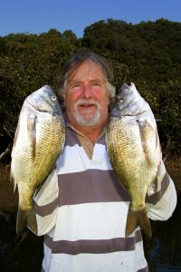 Martin de Lange with a sample of his bream catch from the Barwon estuary.