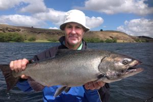 Rob Rees with his 5.68 kg chinook salmon from Lake Purrumbete (Picture: Victorian Inland Charters).   