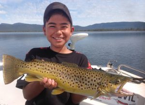 Luis Elgueta junior with his brown trout from Lake Fyans (Picture: Victorian Inland Charters).