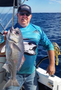 Michael Golby with yet another blue eye trevalla (Picture: Bob McPherson).