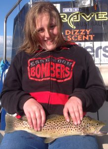 11 year old Dana Worthy with her first brown trout (Picture: Victorian Inland Charters). 