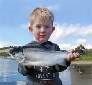 Young blood: Three year old Billy Andrews with a 1.4 kg rainbow trout that he caught from Lake Bullen Merri (Picture: Brad Andrews).