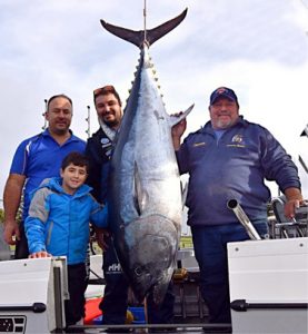 Jamie Peel, Jayden Peel, Chris Zammit and Darren Zammit with their 100 kg tuna from Portland on Saturday (Picture: Bob McPherson).