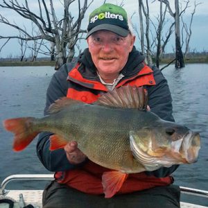 Trevor Holmes with one of the very large redfin he caught from Lake Toolondo recently (Picture: Victorian Inland Charters).