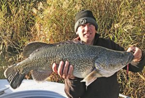 Justin Burns with a 76 cm Murray Cod from Lake Mulwala (Picture: Katryna Burns)