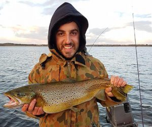 Anthony D’Agostino with the brown trout he caught from Lake Bullen Merri and then released (Picture: Tony D’Agostino).