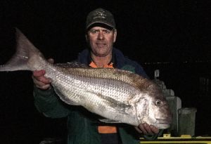 Stuart Scott with a 7 kg snapper he caught from Corio Bay on Wednesday night (Picture: Stuart Scott).