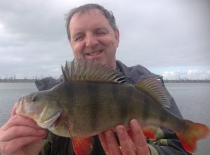 Anthony Forster of Fisheries Victoria with a nice redfin from Lake Toolondo (Picture: Victorian Inland Charters).