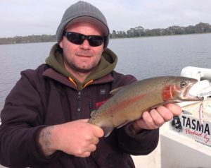 Michael Evans with a 1.2 kg rainbow trout from Lake Wallace at Edenhope (Picture: Victorian Inland Charters).