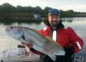 Keysborough Angling Club President Dave Jacobsen with his competition winning fish from the Werribee River on Sunday; a mulloway that measured 95 cm and weighed 7.5 kg (Picture: Chris Hateley).   