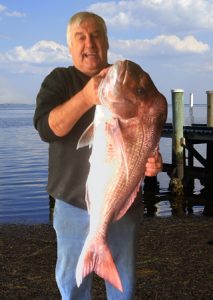 Graham Bate with the 9.7 kg snapper that he caught from Corio Bay last week.