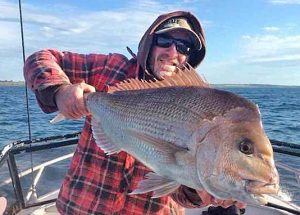 Andrew Johnson with one of the snapper he caught in Corio Bay last Friday.