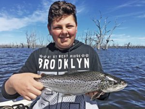 Thomas Petrovic with a pan size brown trout from Lake Toolondo (Picture: Victorian Inland Charters).