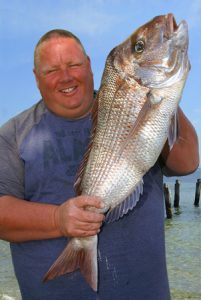 Tickled pink: Dean Hall with his snapper from Corio Bay.