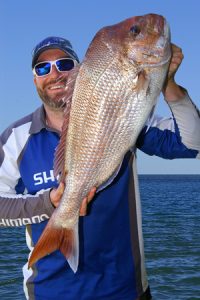 Chris Stamalos with the 7 kg snapper that he caught off Barwon Heads at the weekend.   