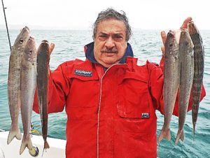 George Gereige with a sample of the whiting presently on offer at Portland (Picture: Bob McPherson).