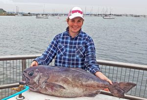 Keryn Millard with the 20 kg blue eye trevalla she caught while bottom bouncing off Portland with her father Dean.