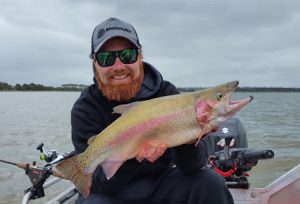 Aaron Habgood of Red’s Fishing Adventures with his 2 kg rainbow trout (Picture: Aaron Habgood).