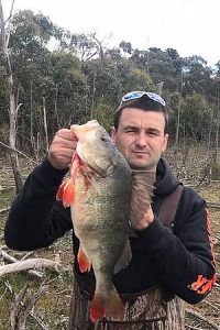 Paul Rahman with a king-size redfin taken from Stony Creek Reservoir along the Geelong/Ballan Road.