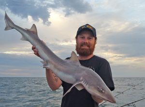 Aaron Habgood with a gummy shark that he caught offshore from Barwon Heads (Picture Aaron Habgood). 