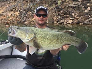 Michael Evans with his cod from Lake Eildon (Picture: Victorian Inland Charters).