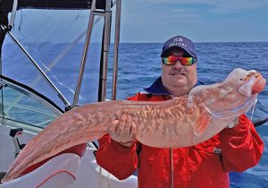 George Gereige with a frothy pink ling taken offshore from Portland (Picture: Bob McPherson).