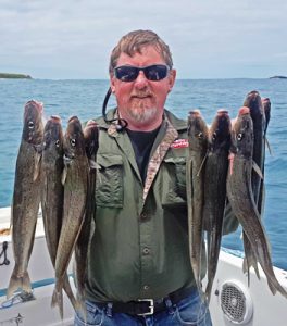 Lachie Wombell with a smple of the whiting he caught at Cape Grant last week (Picture: Bob McPherson).