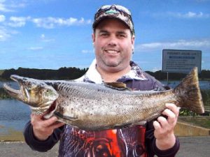 Paul Connor of Warrnambool with the 4 kg brown trout he caught from Lake Purrumbete (Picture: John Clements).   