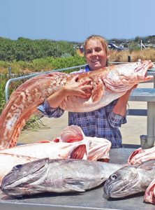 Fresh fish: Keryn Millard with a sample of the catch taken by herself and her father Dean off Portland (Picture: Bob McPherson).