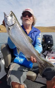 Terry Sheppard with another chinook salmon from Lake Bullen Merri (Picture courtesy of Lake Purrumbete Holiday Park).