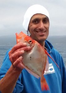 Bill Athanasselis with a silver dory from Lorne.