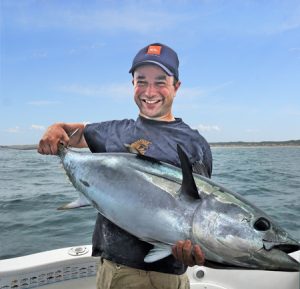 Joash Belousoff with the bluefin tuna he caught offshore from Barwon Heads.