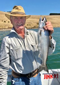 Bill Thomas with a chinook salmon that he caught from Lake Bullen Merri (Picture: Victorian Inland Charters (South West).