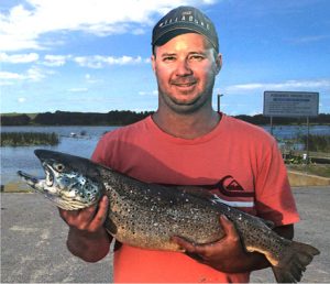 Craig Cooper with his 3.6 kg brown trout from Lake Purrumbete (Picture: Courtesy Lake Purrumbete Holiday Park).