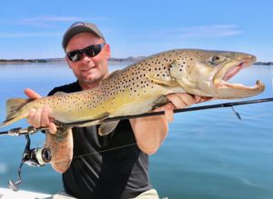 Michael Evans with a male brown trout of 3.8 kg from Lake Purrumbete (Picture: Victorian Inland Charters, South West).    