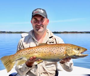 Tim Beusmans with another brown trout from Lake Purrumbete (Picture: Victorian Inland Charters, South West). 