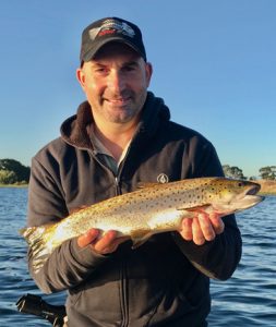 Tim Beusmans with another brown trout from Lake Purrumbete (Picture: Victorian Inland Charters, South West).